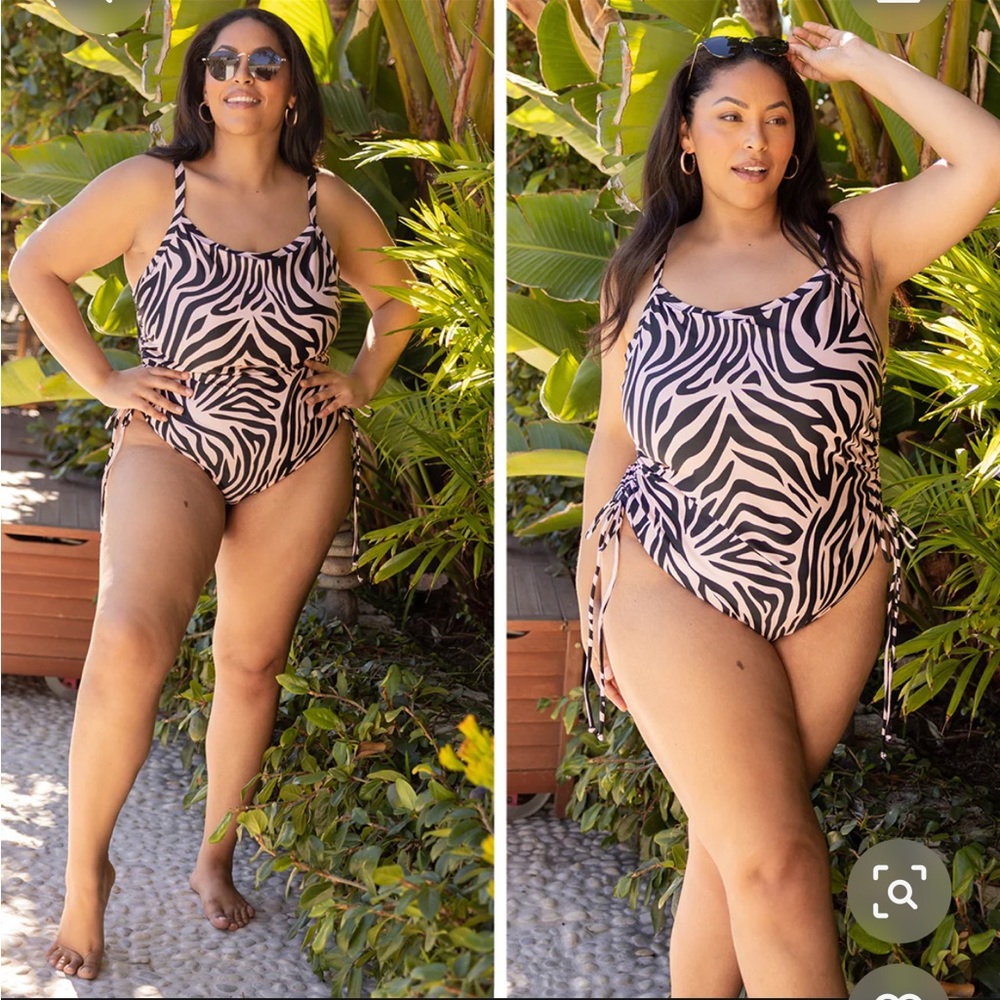 Cute, new with tags, zebra patterned one piece swimsuit